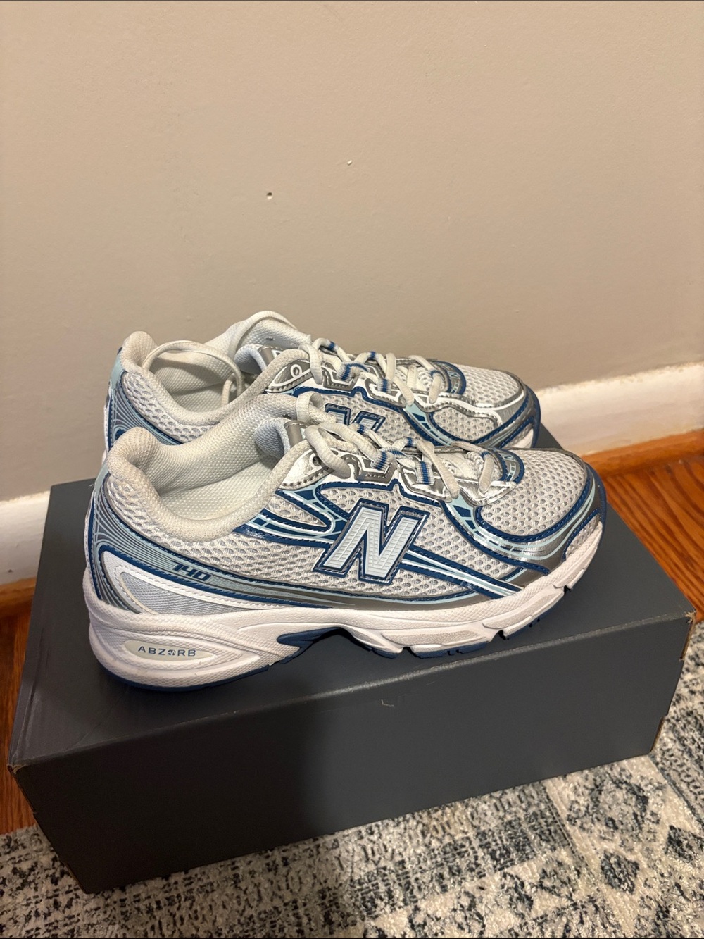 New Balance Kids White and Blue Athletic Sneakers